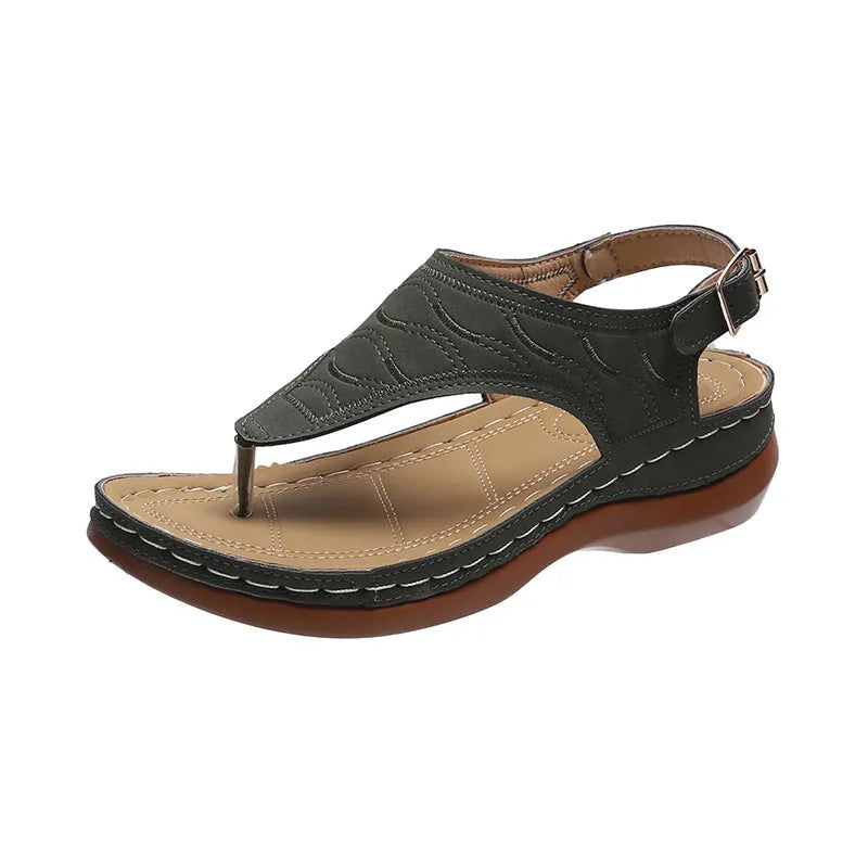 Women's black casual wedge heel sandals with an adjustable back strap buckle.