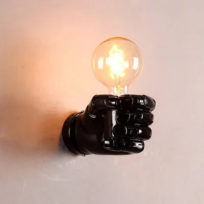 Creative resin fist wall lamp in black, white, or wood grain for left or right hand mounting.