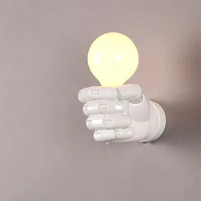 Creative resin fist wall lamp in black, white, or wood grain for left or right hand mounting.