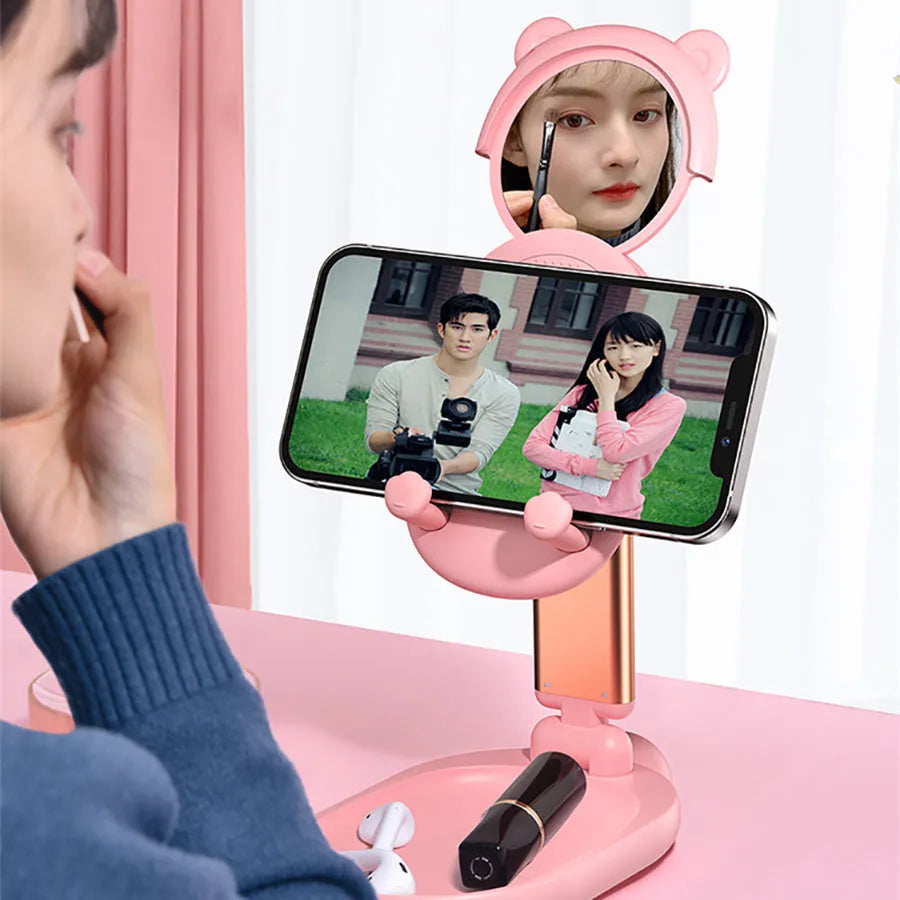 Portable tablet stand with mirror in blue colour holding an Apple-compatible device