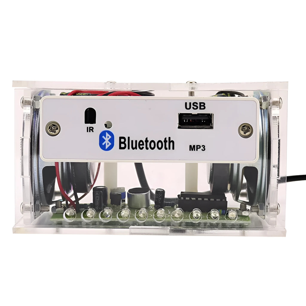 Bluetooth speaker DIY kit components including circuit board, loose electronics, speaker, and clear plastic shell.