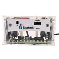 Bluetooth speaker DIY kit components including circuit board, loose electronics, speaker, and clear plastic shell.