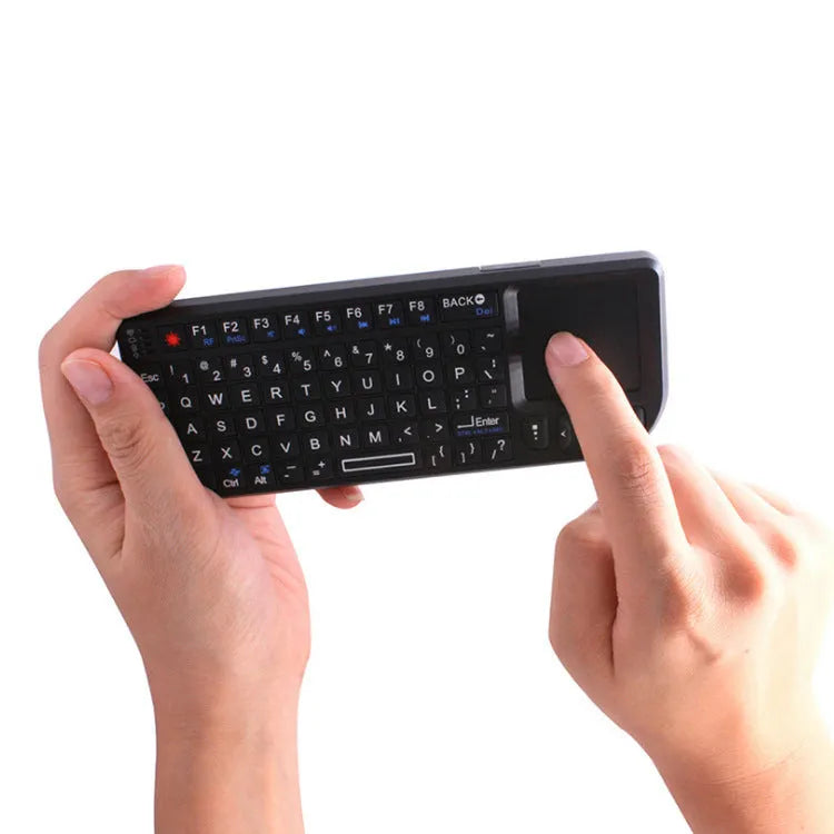Mini wireless Bluetooth laser touch keyboard with 7 colour backlight and ABS construction