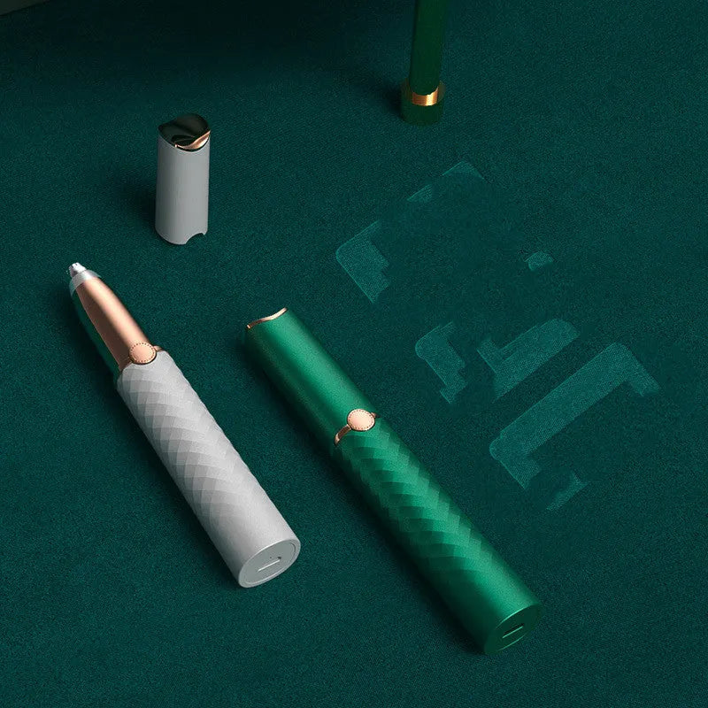 White electric eyebrow trimmer with stainless steel blades and LED light, 12.2 cm portable size