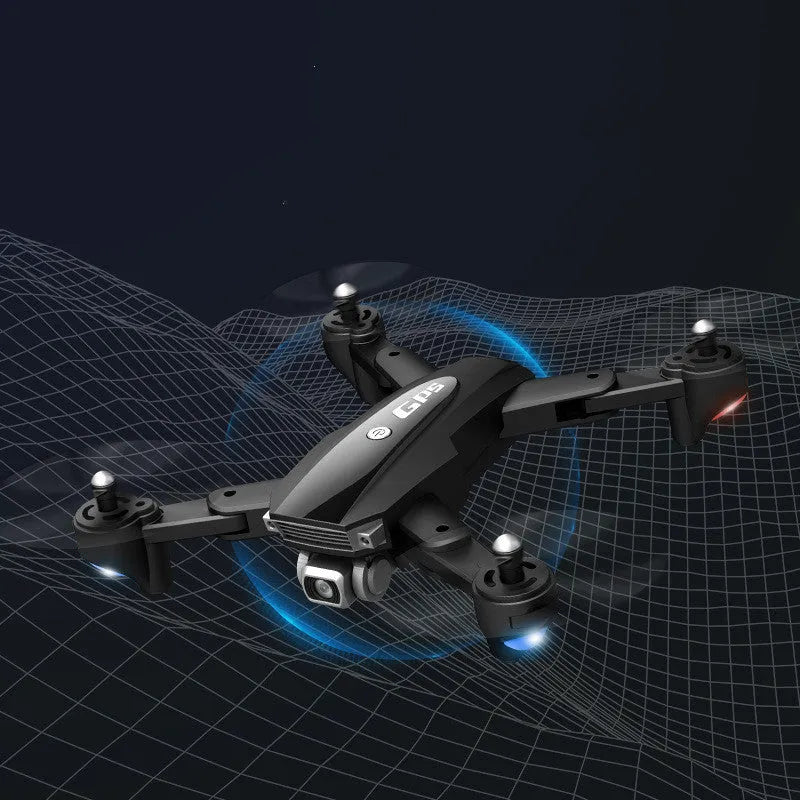 Children's black folding 4K quadrocopter drone with remote control showing camera and folding arms