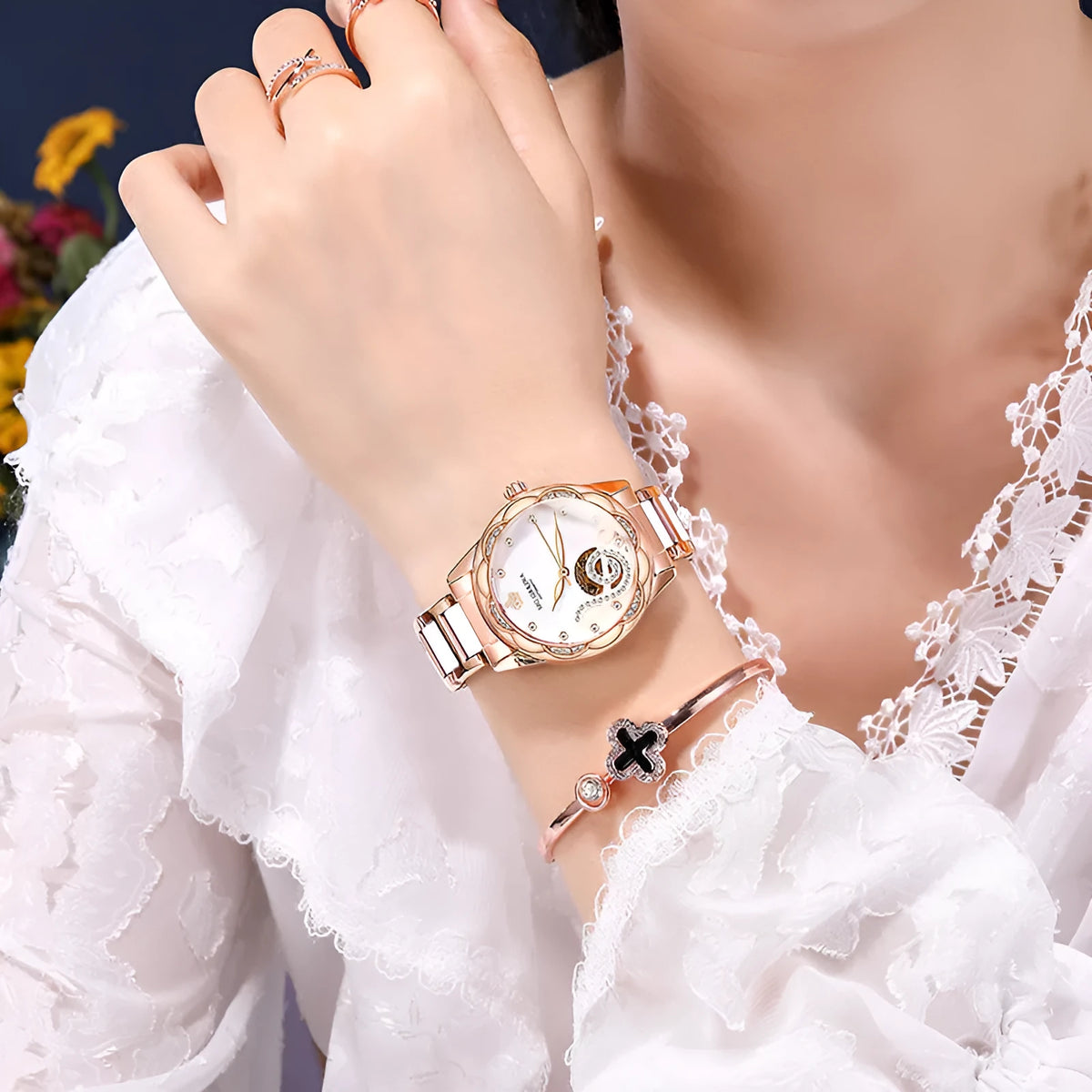 Women's mechanical watch with green dial, stainless steel strap, 36mm round case, and luminous pointer