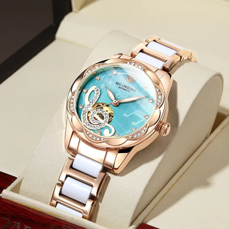 Women's mechanical watch with green dial, stainless steel strap, 36mm round case, and luminous pointer