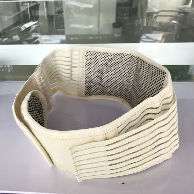 Beige self-heating magnetic waist protection fixed belt made of elastic cloth, shown laid flat.