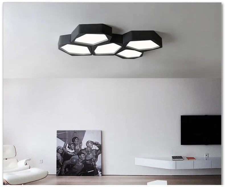 Geometric shaped iron LED light fixture in black or white for living room and bedroom.