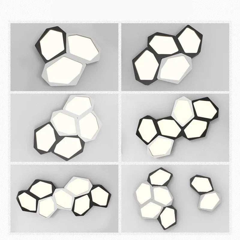Geometric shaped iron LED light fitting in black or white with remote control for dimming and colour temperature.
