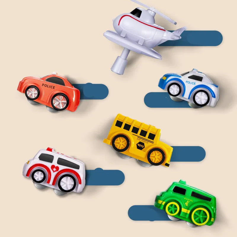Large plastic car parking lot toy with crane, conveyor belt, and included toy vehicles for toddlers