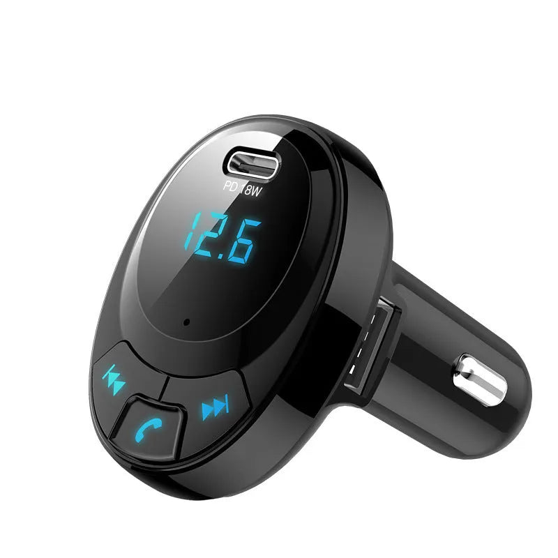 Black car MP3 player with Bluetooth, digital display, and dual USB ports for charging.