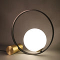 Creative decorative iron table lamp with warm and white light in a modern simple style