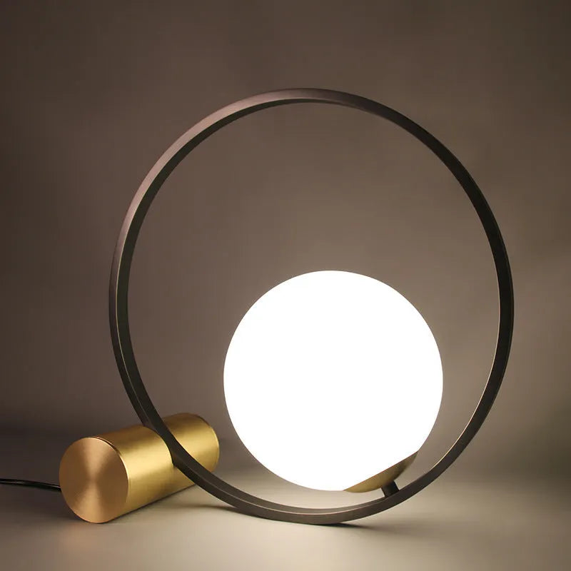Creative decorative iron table lamp with warm and white light in a modern simple style