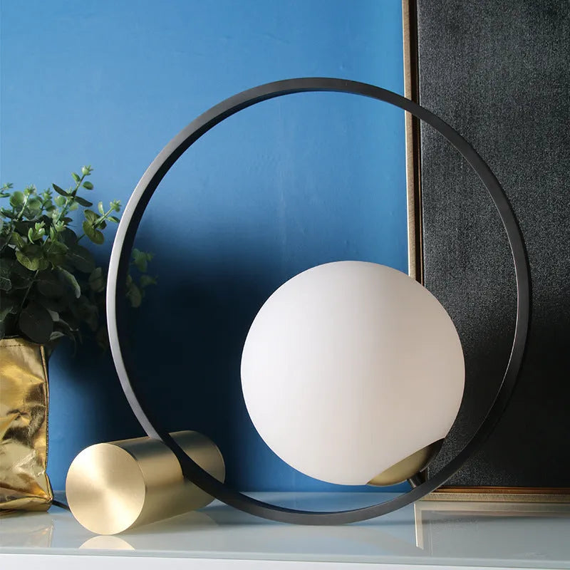 Creative decorative iron table lamp with warm and white light in a modern simple style