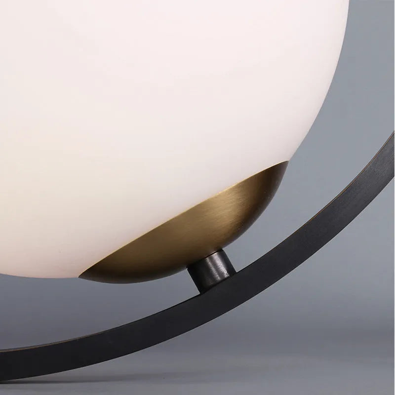 Creative decorative iron table lamp with warm and white light in a modern simple style