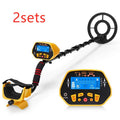 GC1028 black and yellow metal detector with LCD display and adjustable pole, showing waterproof search coil.