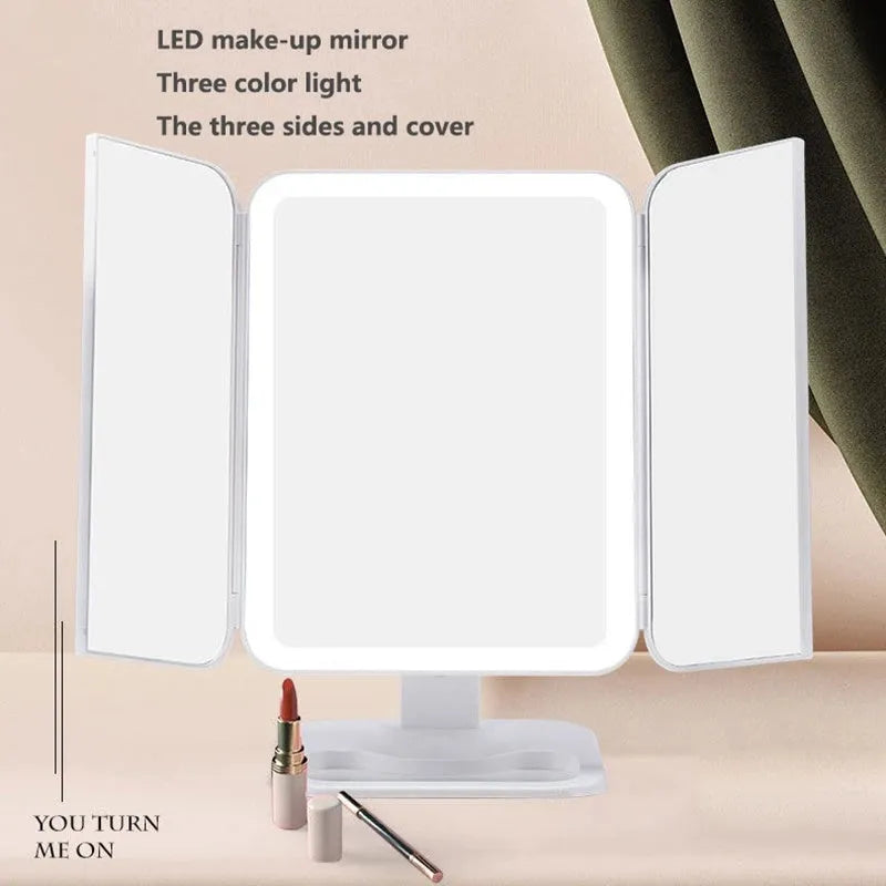 Trifold makeup mirror with 68 LED lights, 10X detachable magnifying mirror, and 180-degree rotation on a table