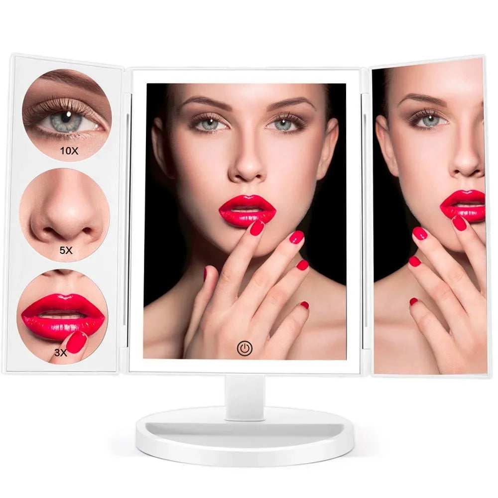 Trifold makeup mirror with 68 LED lights, 10X detachable magnifying mirror, and 180-degree rotation on a table