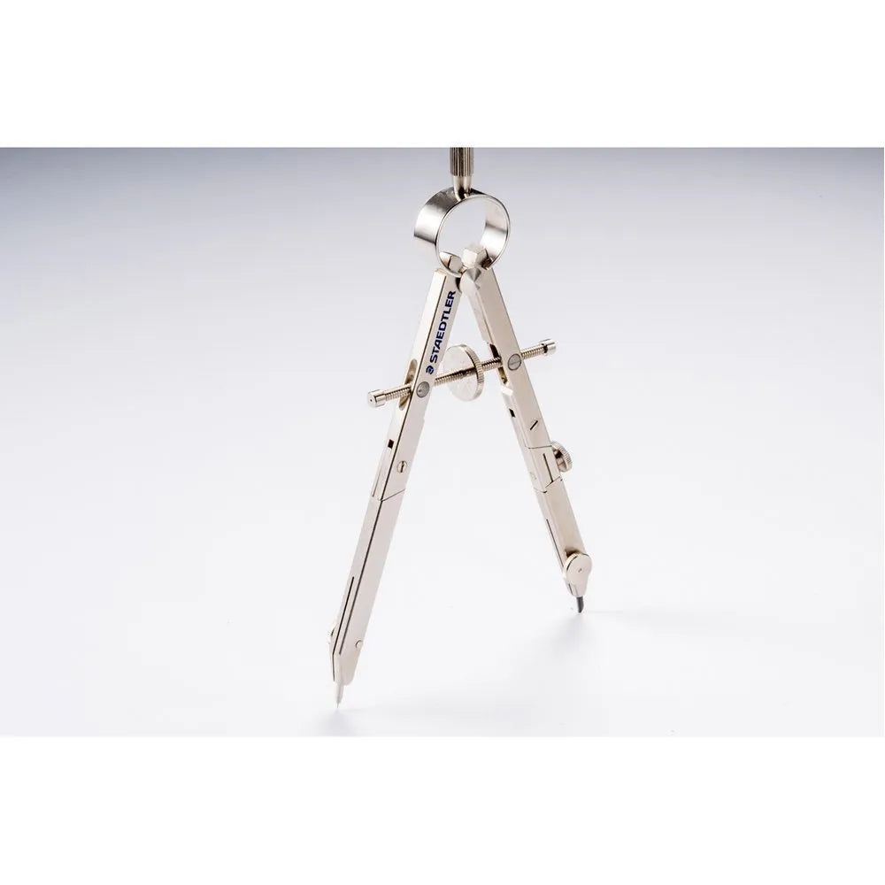 STAEDTLER 551 01 steel precision drawing compass with extended telescopic rod on technical paper.