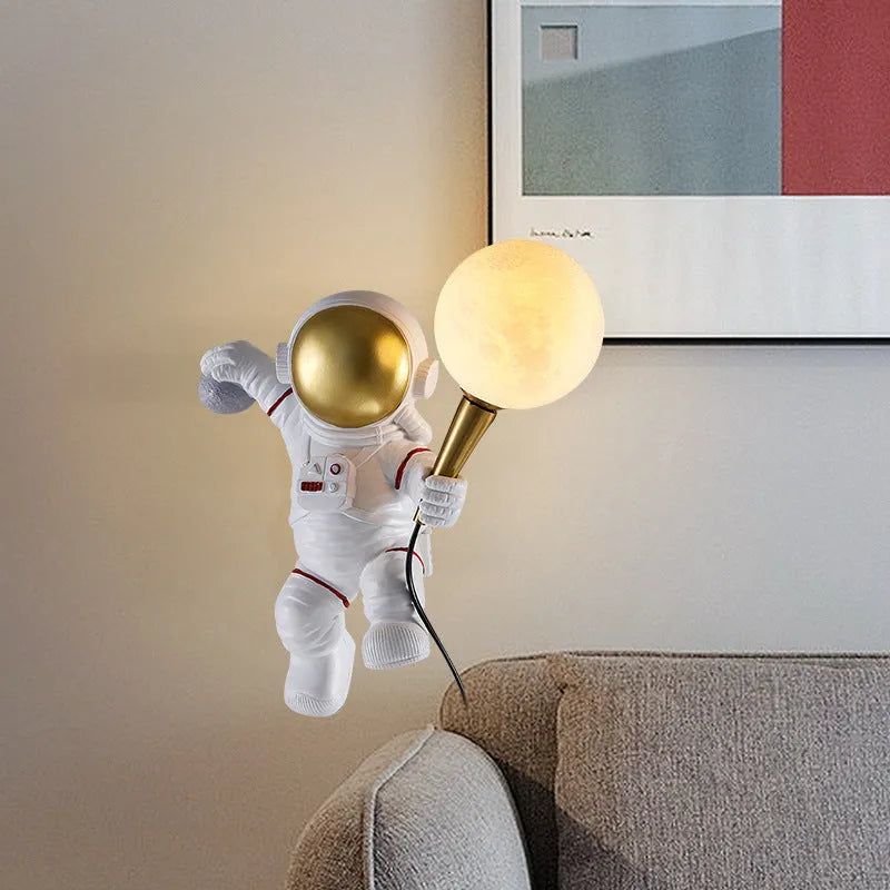 White astronaut desk lamp in three styles: standing, seated, and wall-mounted configurations