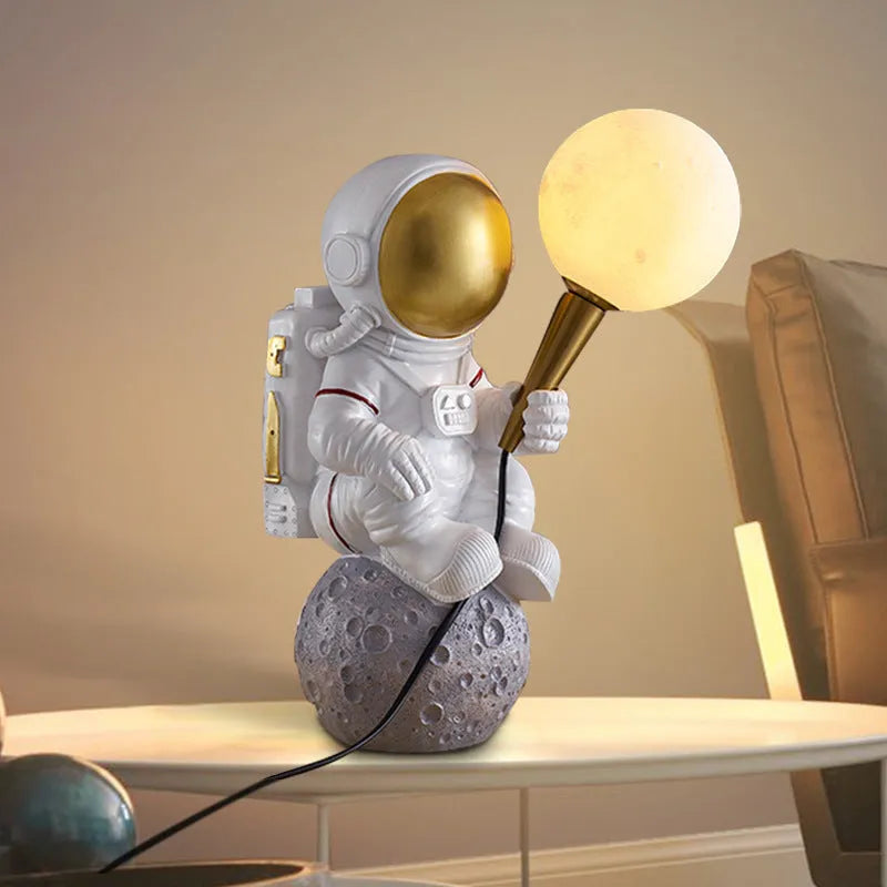 White astronaut desk lamp in three styles: standing, seated, and wall-mounted configurations