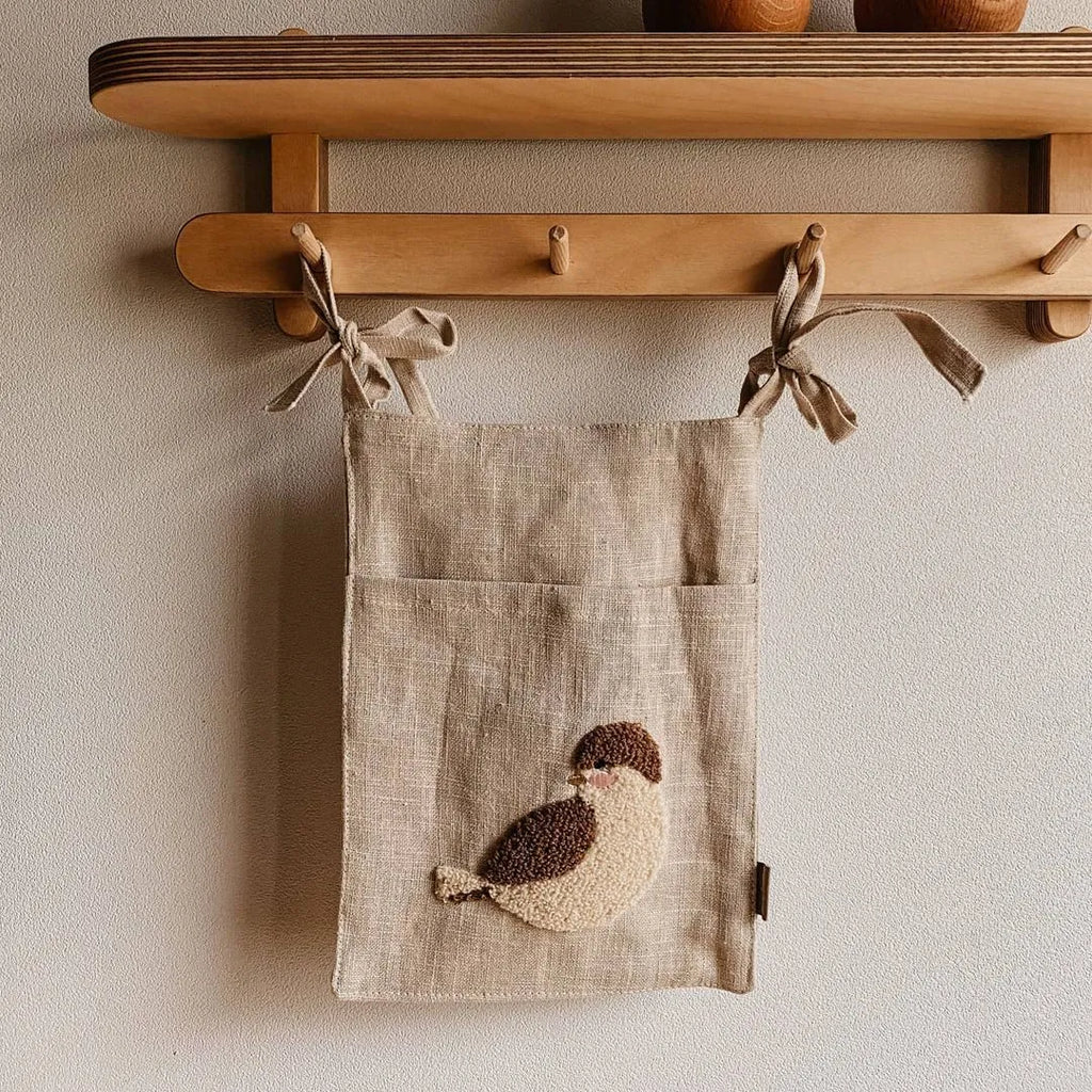 Khaki cotton linen hanging storage bag with single pocket design for bedside organisation
