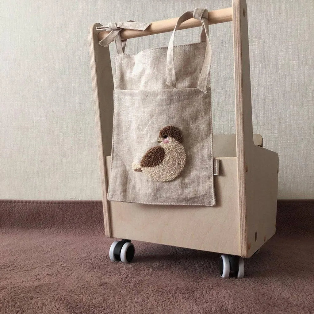 Khaki cotton linen hanging storage bag with single pocket design for bedside organisation