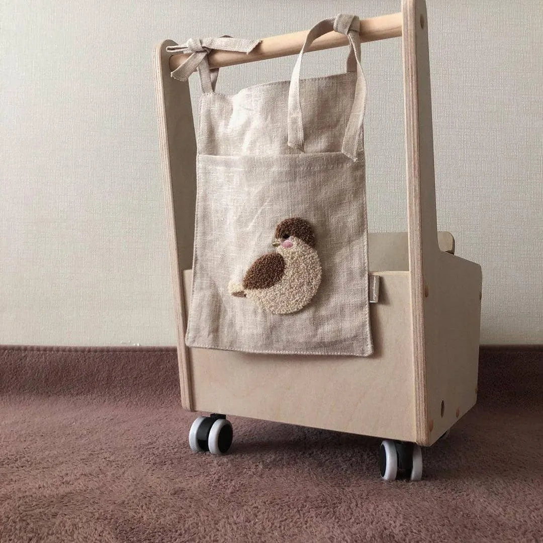 Khaki cotton linen hanging storage bag with single pocket design for bedside organisation