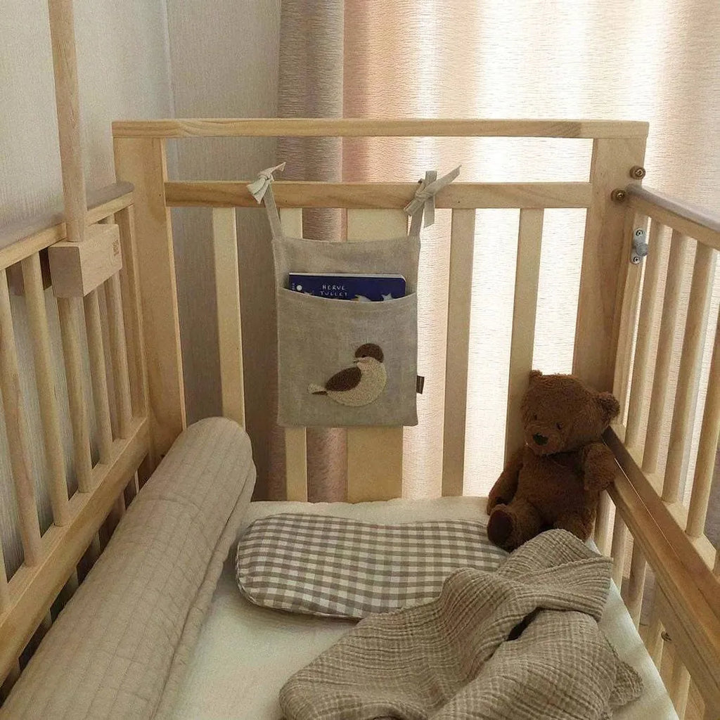 Khaki cotton linen hanging storage bag with single pocket design for bedside organisation