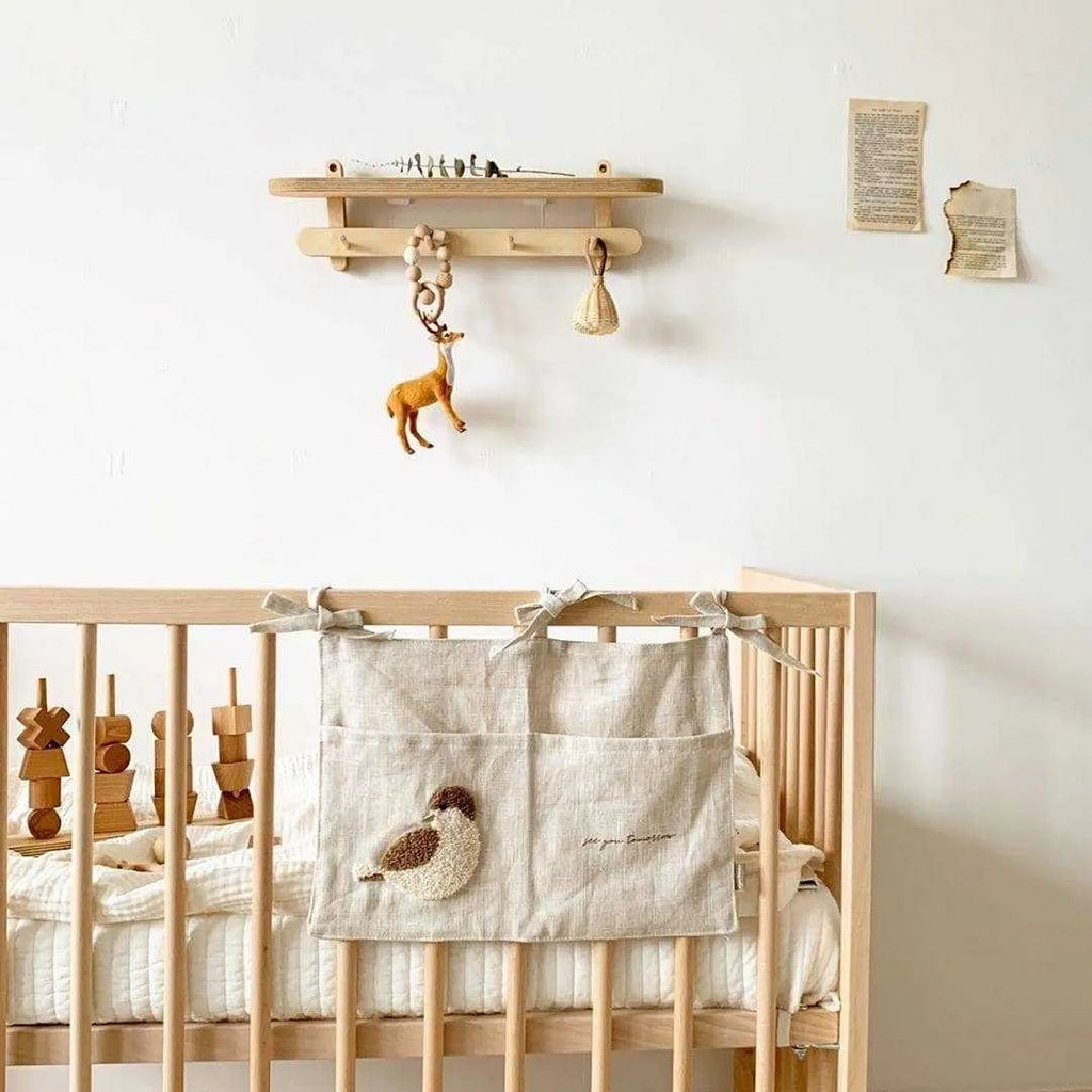 Khaki cotton linen hanging storage bag with single pocket design for bedside organisation