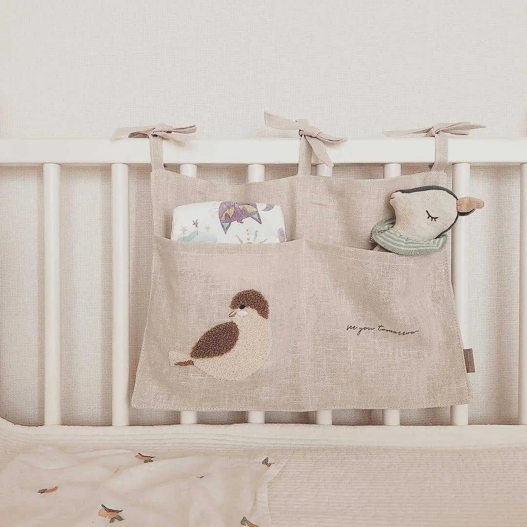 Khaki cotton linen hanging storage bag with single pocket design for bedside organisation
