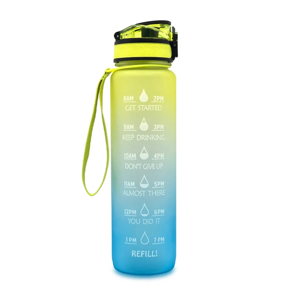 Blue and red gradient 1-litre Tritan sports water bottle with time markers, flip-top lid, and wrist strap.