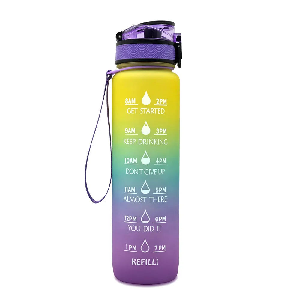 Blue and red gradient 1-litre Tritan sports water bottle with time markers, flip-top lid, and wrist strap.