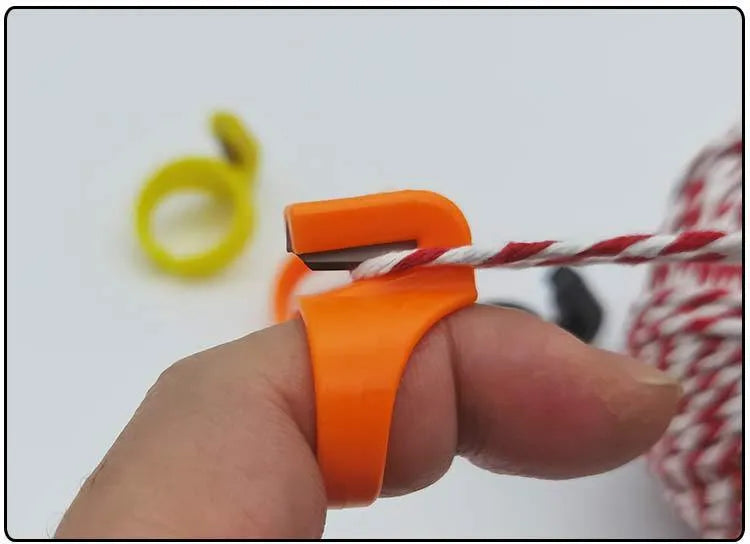 Ring knife seam ripper with 2cm carbon steel blade and ABS plastic handle in black, orange, and yellow colours