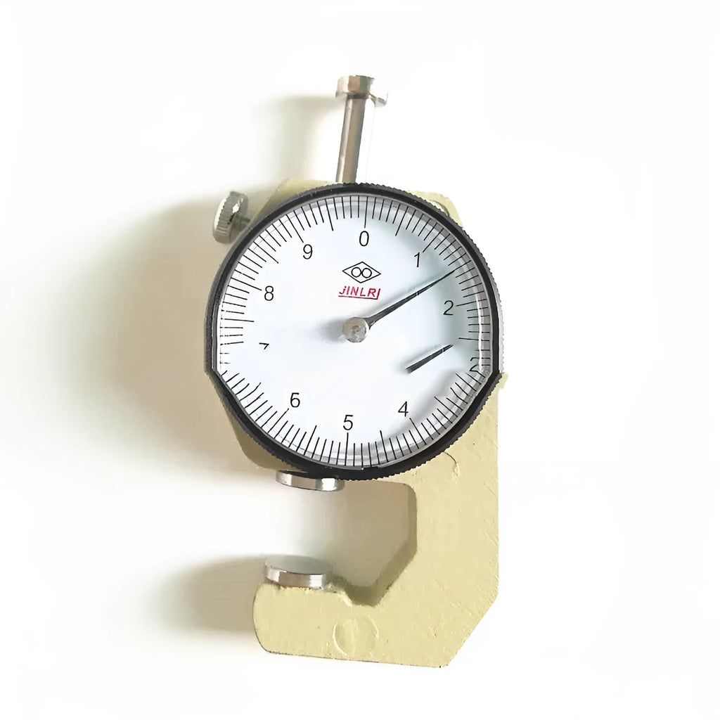 Handheld digital thickness gauge for measuring steel tubes, films, and cloth materials.