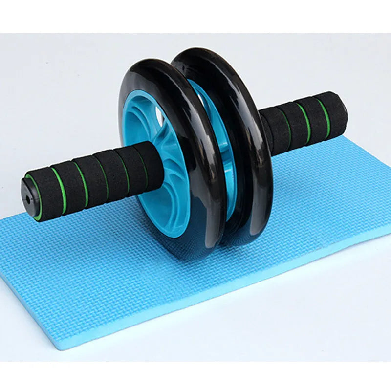 Green two-wheel abdominal wheel roller with 14-inch kneeling mat on floor for home exercise