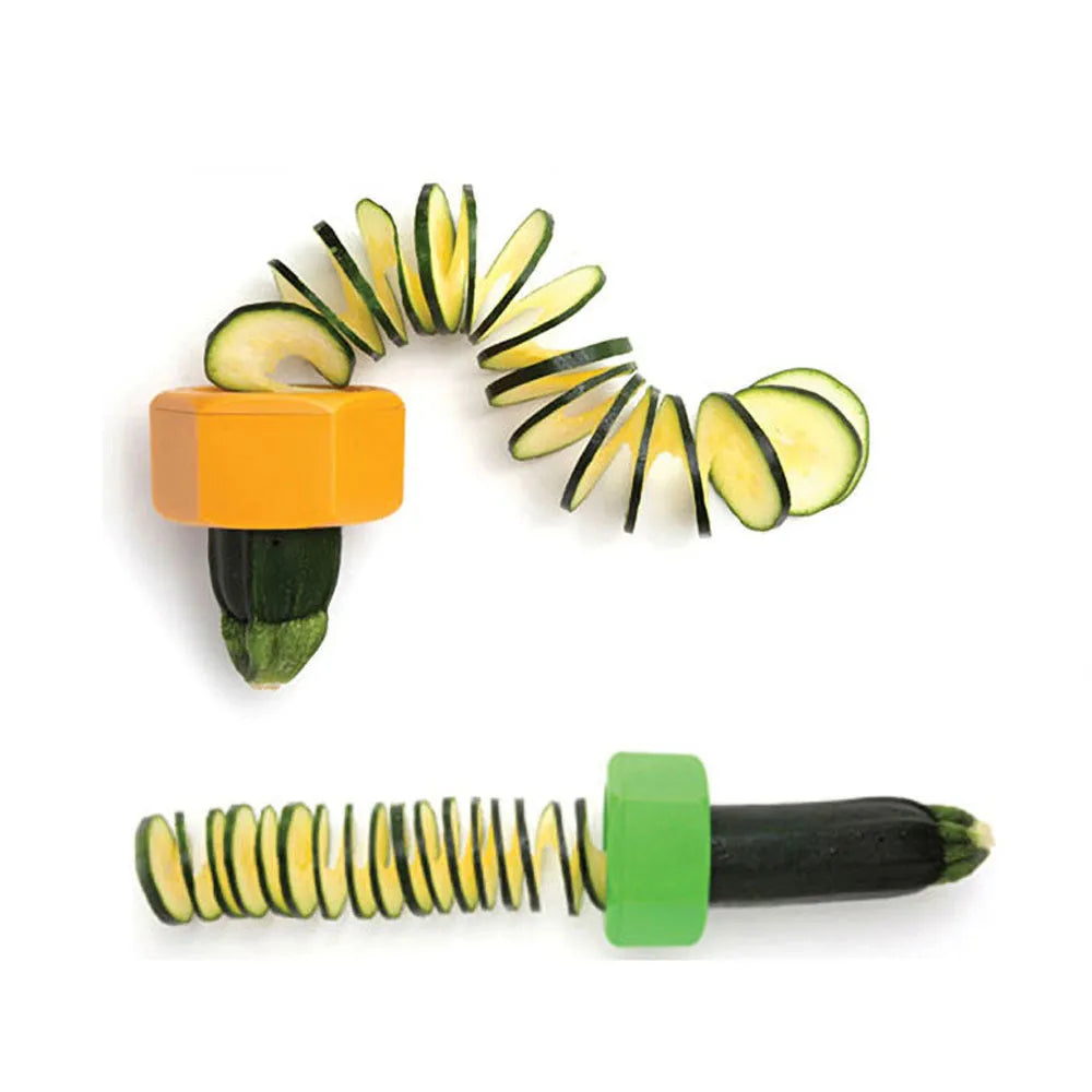 Yellow and green plastic spiral vegetable cutter for kitchen use on a white background.
