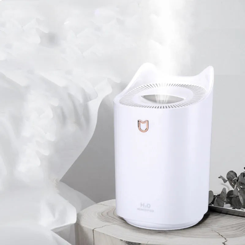 USB-powered double spray humidifier with large water tank in coral pink or white colour.