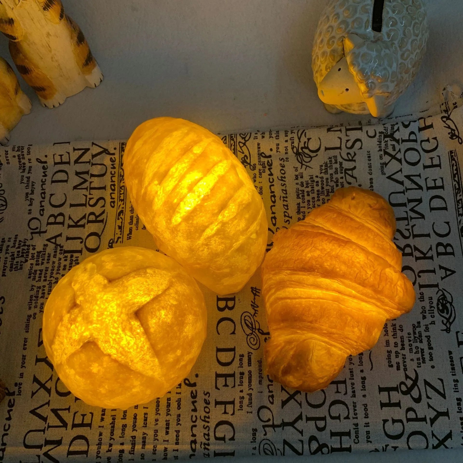 Simulation croissant-shaped LED night light on a table