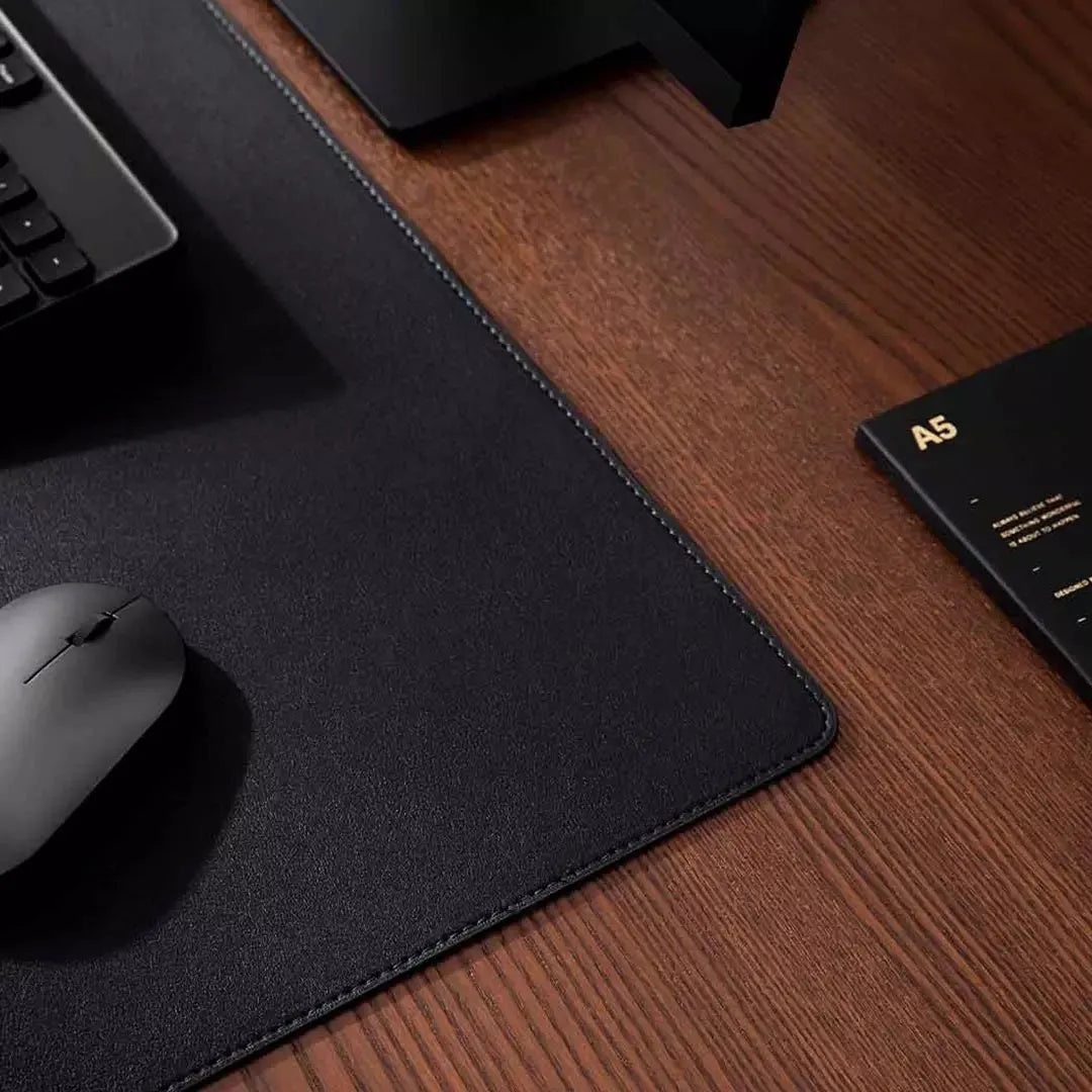 Extra large 800x400mm black gaming mouse pad with double-material waterproof construction on a desk