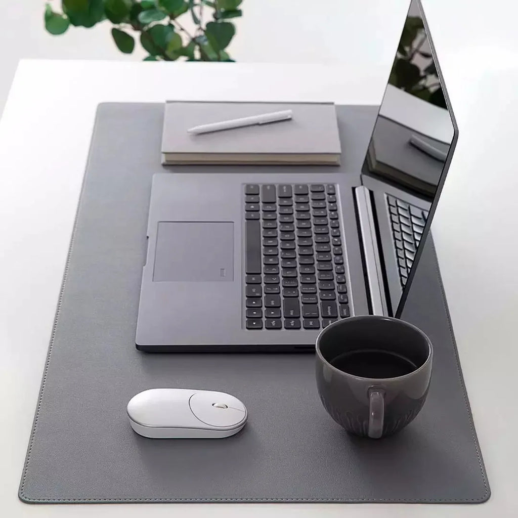 Extra large 800x400mm black gaming mouse pad with double-material waterproof construction on a desk