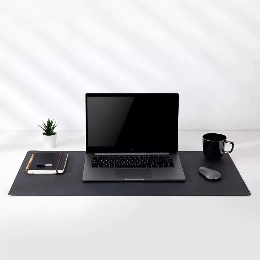 Extra large 800x400mm black gaming mouse pad with double-material waterproof construction on a desk
