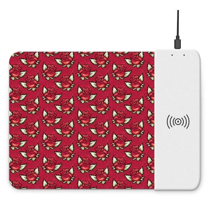 Cartoon dot print wireless charging mouse pad with RGB lighting on a desk