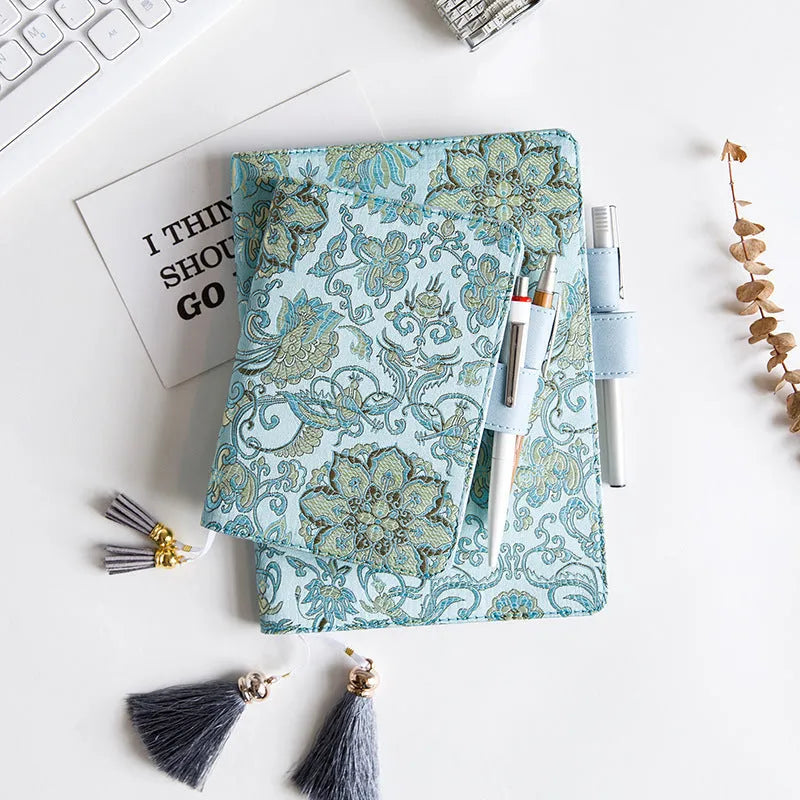 Fabric notebook with Flying Blue Flowers design showing A5 and A6 size options