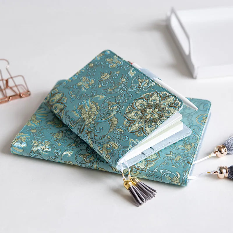 Fabric notebook with Flying Blue Flowers design showing A5 and A6 size options