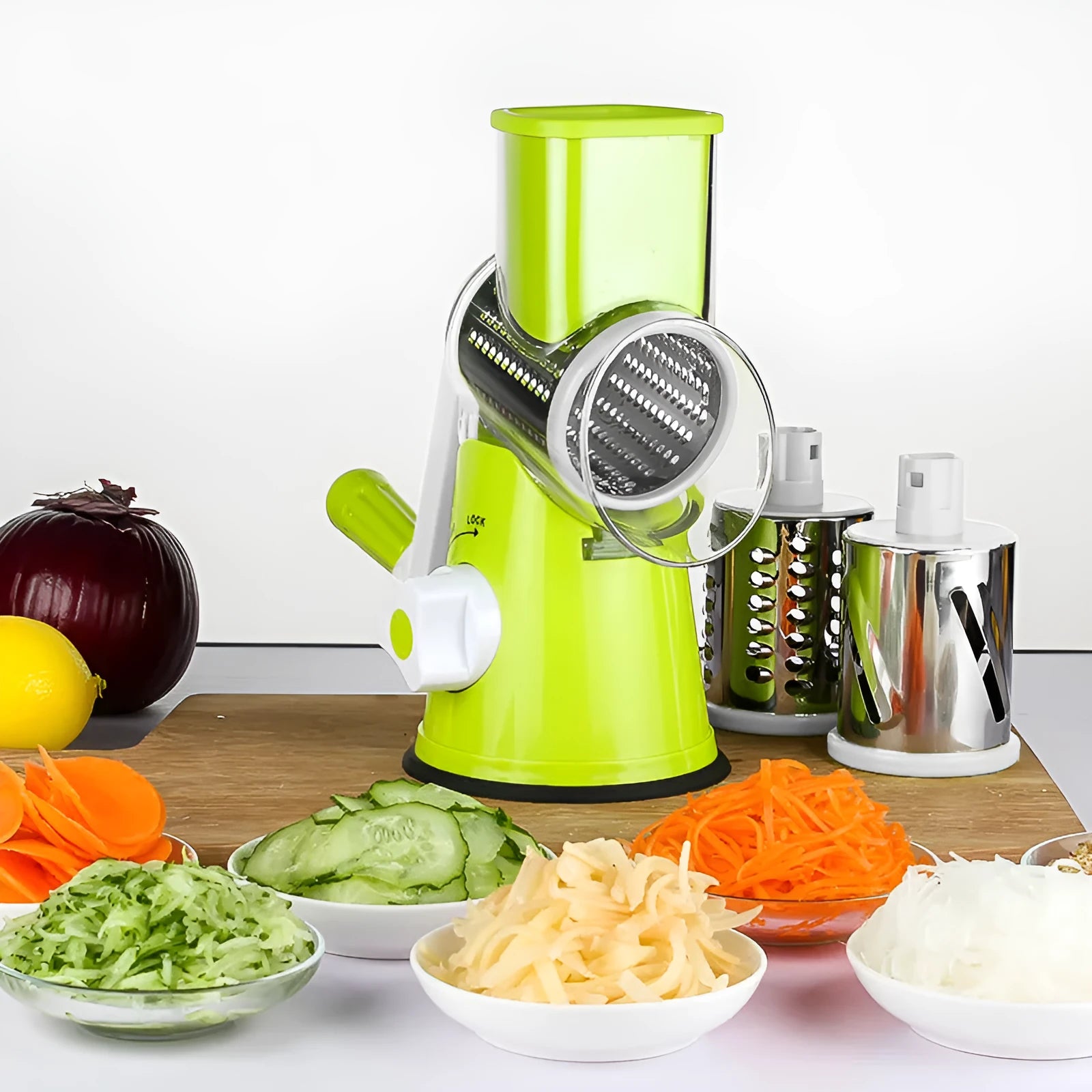 Blue multi-function vegetable chopper and slicer with roller handle and suction cup base on a kitchen counter.