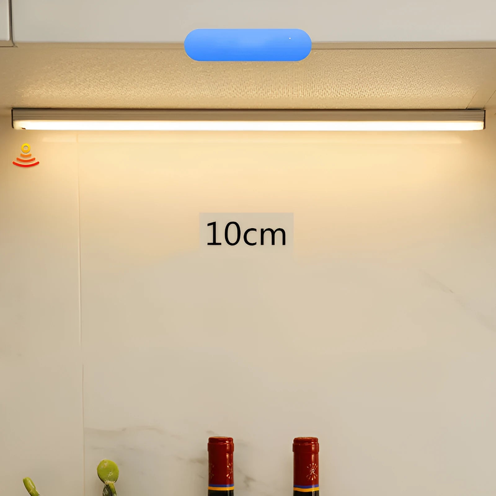 Hand-scanning induction LED cabinet lamp strip with rechargeable battery and adhesive backing