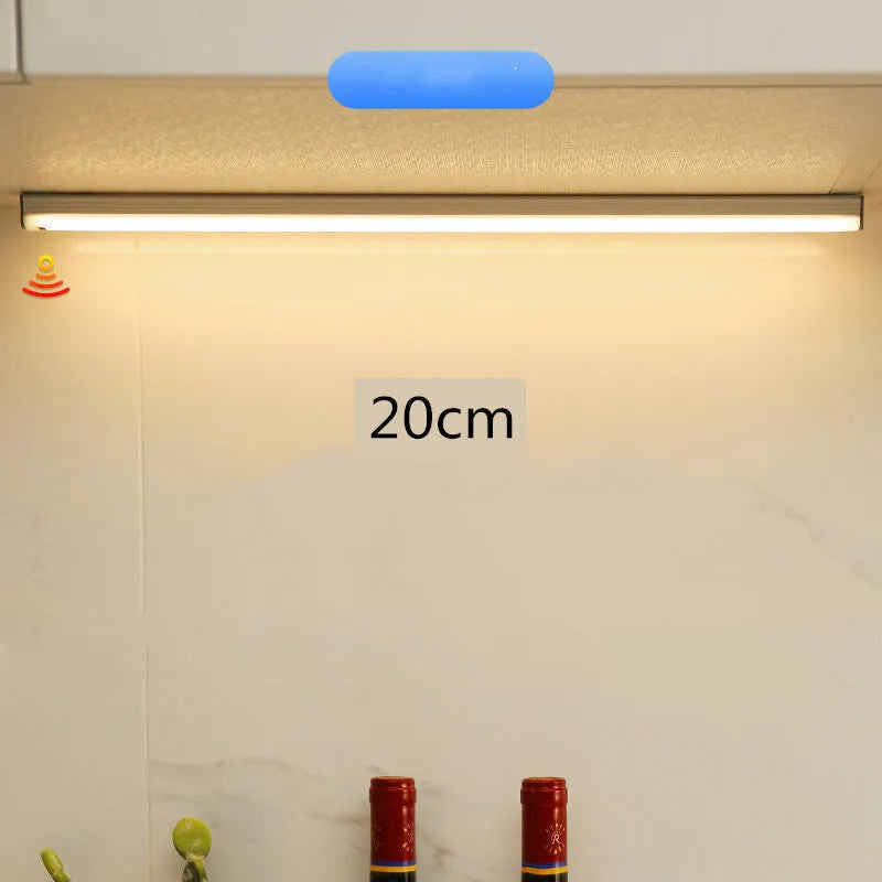 Hand-scanning induction LED cabinet lamp strip with rechargeable battery and adhesive backing