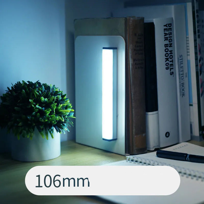 Hand-scanning induction LED cabinet lamp strip with rechargeable battery and adhesive backing